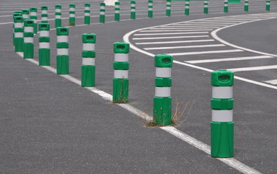 High angle view of bollards on road