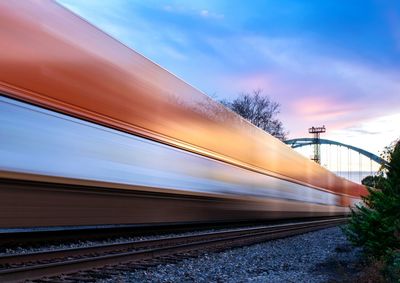 Railroad track against blue sky