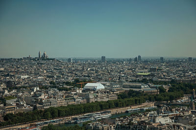 Buildings skyline in a sunny day, seen from the eiffel tower at paris. the famous capital of france.