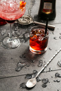 High angle view of drinks on slate