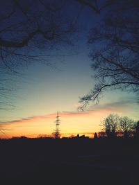 Silhouette bare tree against sky during sunset