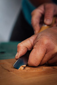 Close-up of man holding hand