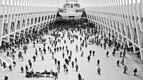 High angle view of people walking in train station