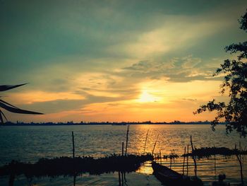 Scenic view of sea against sky during sunset