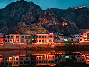 Buildings in city at dusk