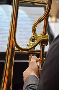 Cropped image of musician playing trumpet