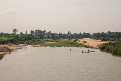 Scenic view of river against sky