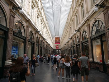 Group of people walking in building