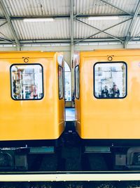 Yellow train in city