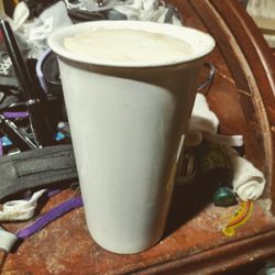 Close-up of coffee cup on table