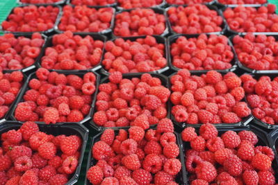 Full frame shot of raspberries for sale at market