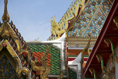 Low angle view of temple against building