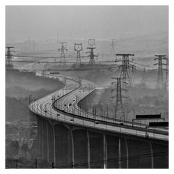 Traffic winding through the smoggy road