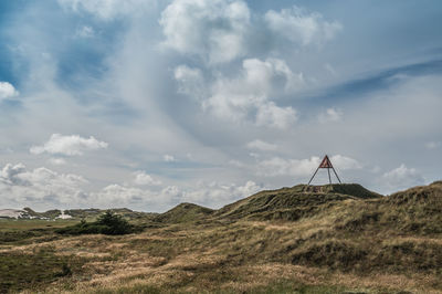 Beacon in the sand dunes at danish westcoast at nørre lyngvig