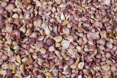 Full frame shot of garlic for sale at market stall