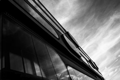 Low angle view of office building against sky