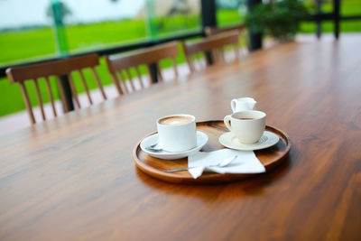 Close-up of coffee cup on table