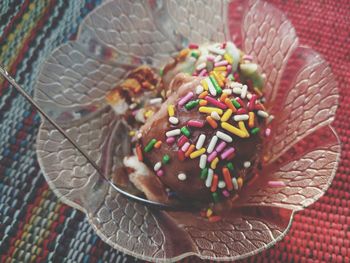 High angle view of candies in container