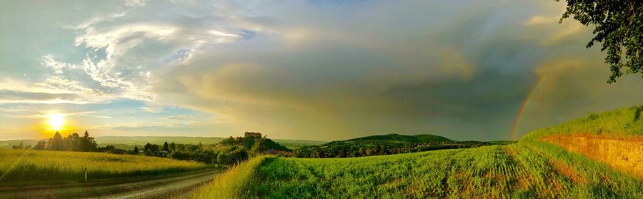 Scenic view of landscape against sky during sunset