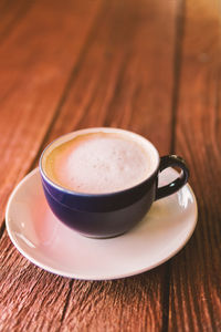 Close-up of coffee cup on table
