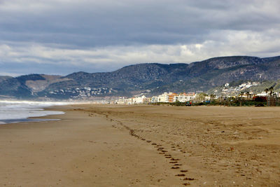 Scenic view of beach against sky