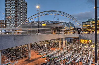 Bicycle parking facility next to blaak railway station in rotterdam at dusk