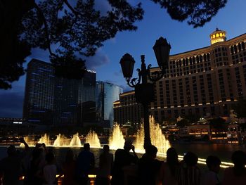 Group of people in city at night