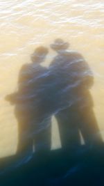 High angle view of shadow on sand