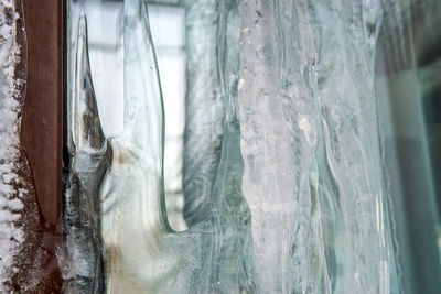 Full frame shot of frozen glass window