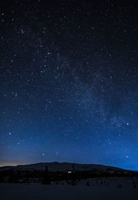 Scenic view of star field against sky at night