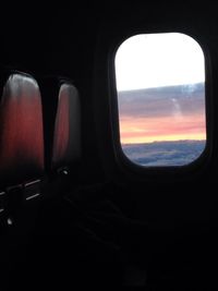 Scenic view of landscape against sky at sunset