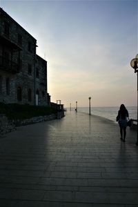 Women at beach during sunset