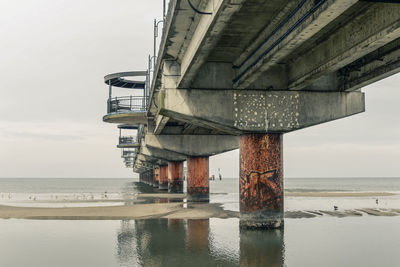 High angle view of bridge over sea against sky