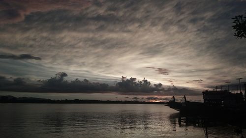 Scenic view of sea against sky at sunset