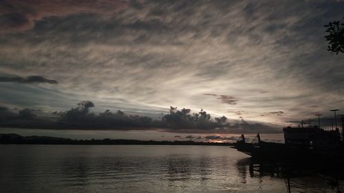 Scenic view of sea against sky at sunset