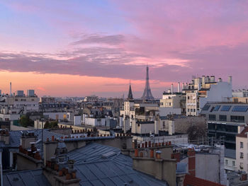 High angle view of buildings against sky during sunset