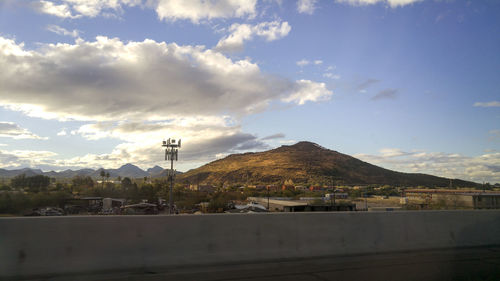 Scenic view of mountains against sky at dusk