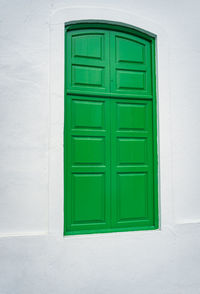 Closed blue door of building