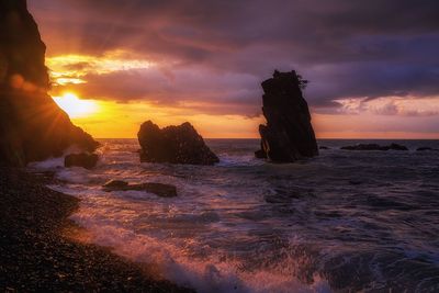 Scenic view of sea against sky during sunset