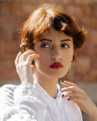 Close-up of young woman with eyes closed