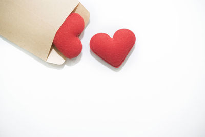 Close-up of heart shape over white background