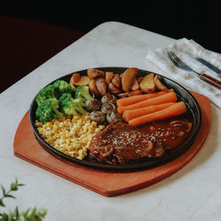 Close-up of food in plate on table