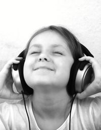 Close-up portrait of smiling girl