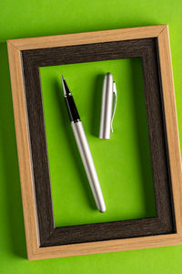 High angle view of pen on table