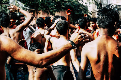 Rear view of people enjoying music concert