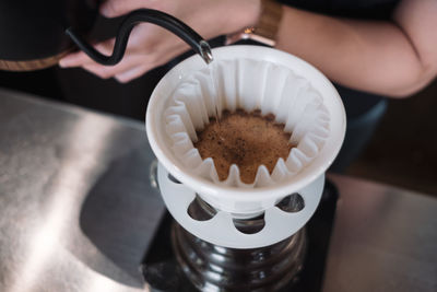 High angle view of coffee cup on table