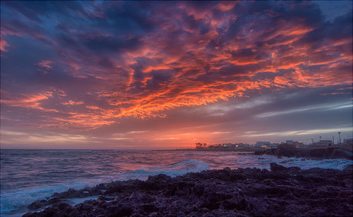 Scenic view of sea against sky during sunset