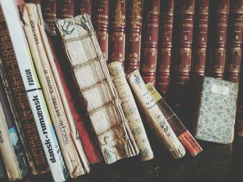 Close-up of text on shelf