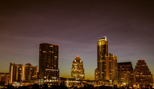 Low angle view of illuminated cityscape