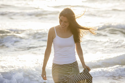 Full length of woman on beach